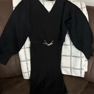 Chic Black Dress with Gold Chain Detail